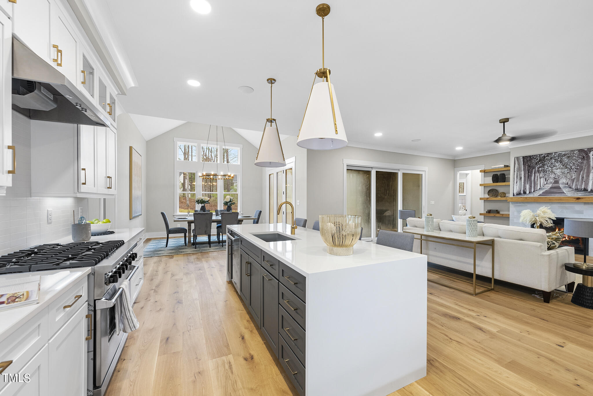 7820 Ailesbury Road Wake Forest, NC 27587 - Photo 3 of 35 a kitchen with sink stove and cabinets