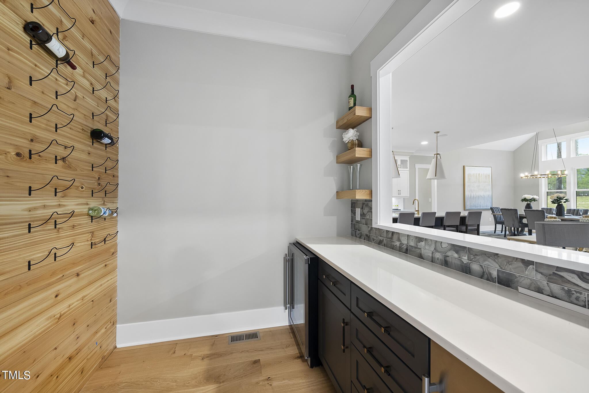 7820 Ailesbury Road Wake Forest, NC 27587 - Photo 5 of 35 a view of a kitchen from a hallway