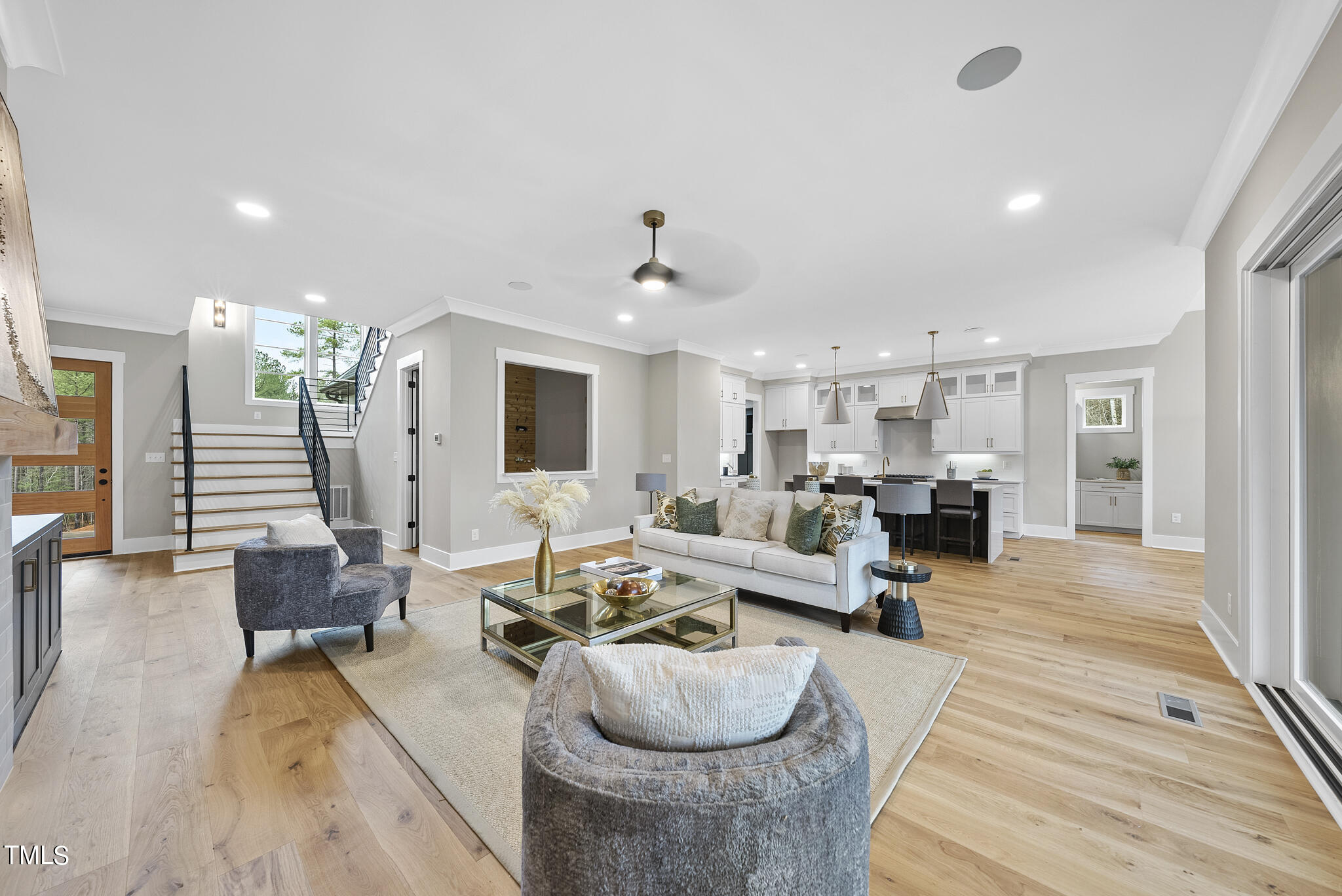 7820 Ailesbury Road Wake Forest, NC 27587 - Photo 6 of 35 a living room with furniture and wooden floor