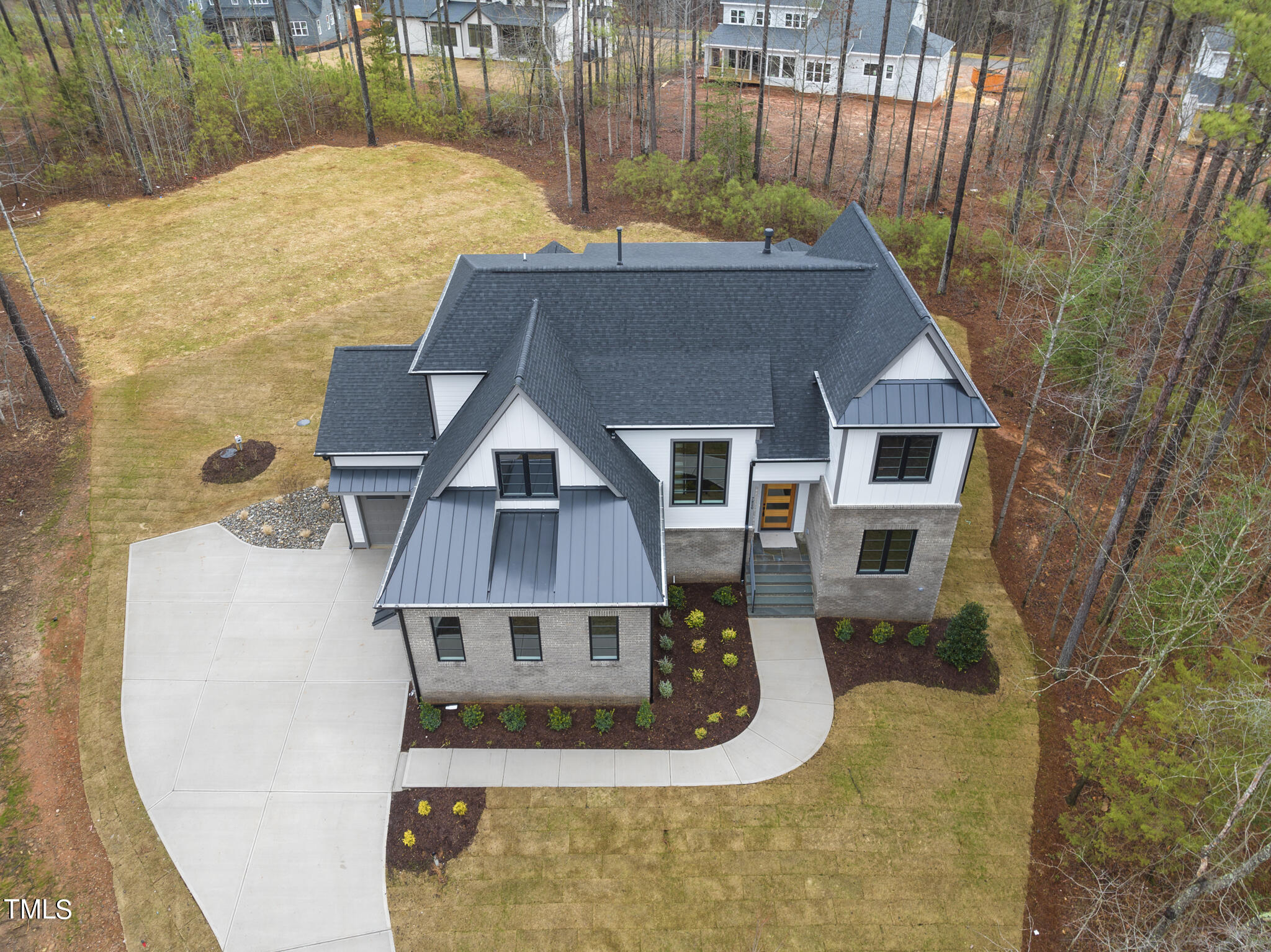 7820 Ailesbury Road Wake Forest, NC 27587 - Photo 8 of 35 an aerial view of a house with swimming pool