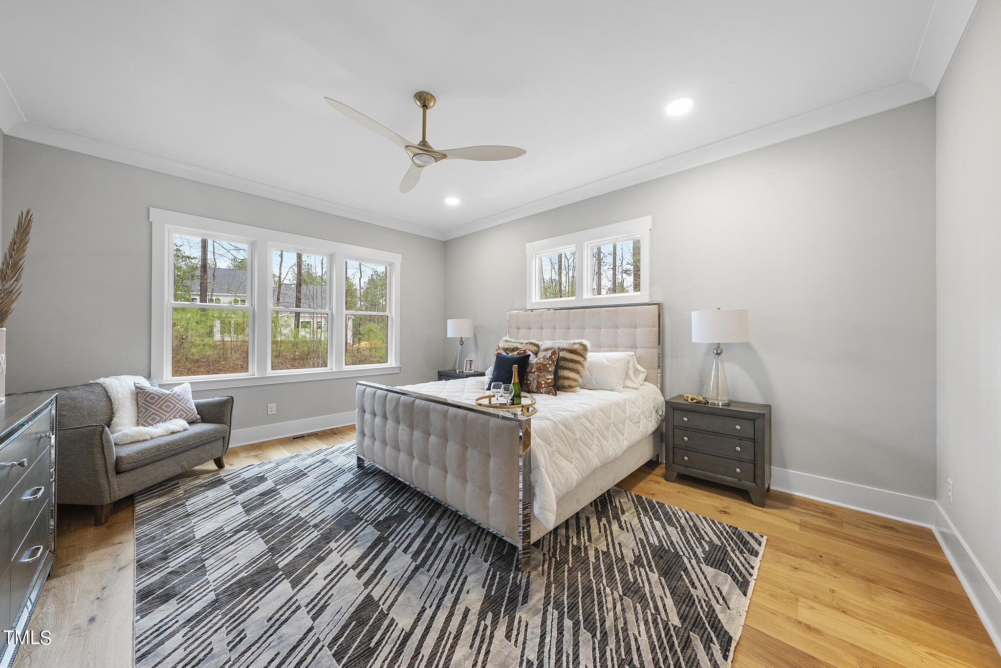 7820 Ailesbury Road Wake Forest, NC 27587 - Photo 9 of 35 a bed room with a bed and a couch