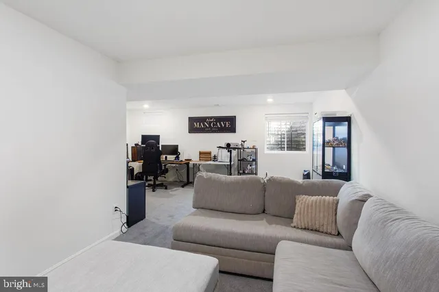 a living room with furniture and a couch