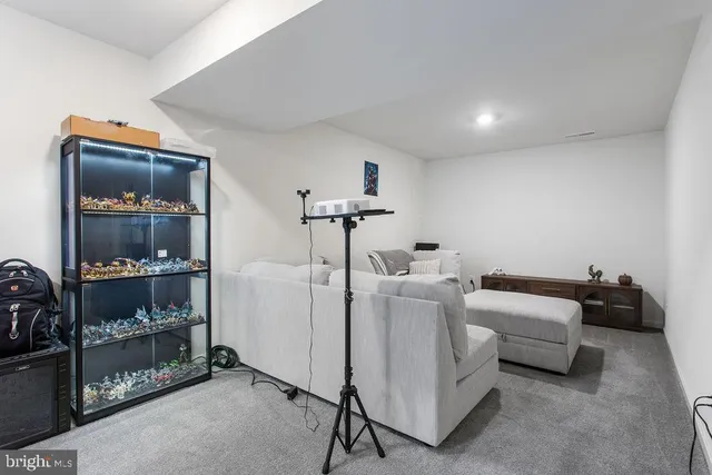 a living room with furniture and decor