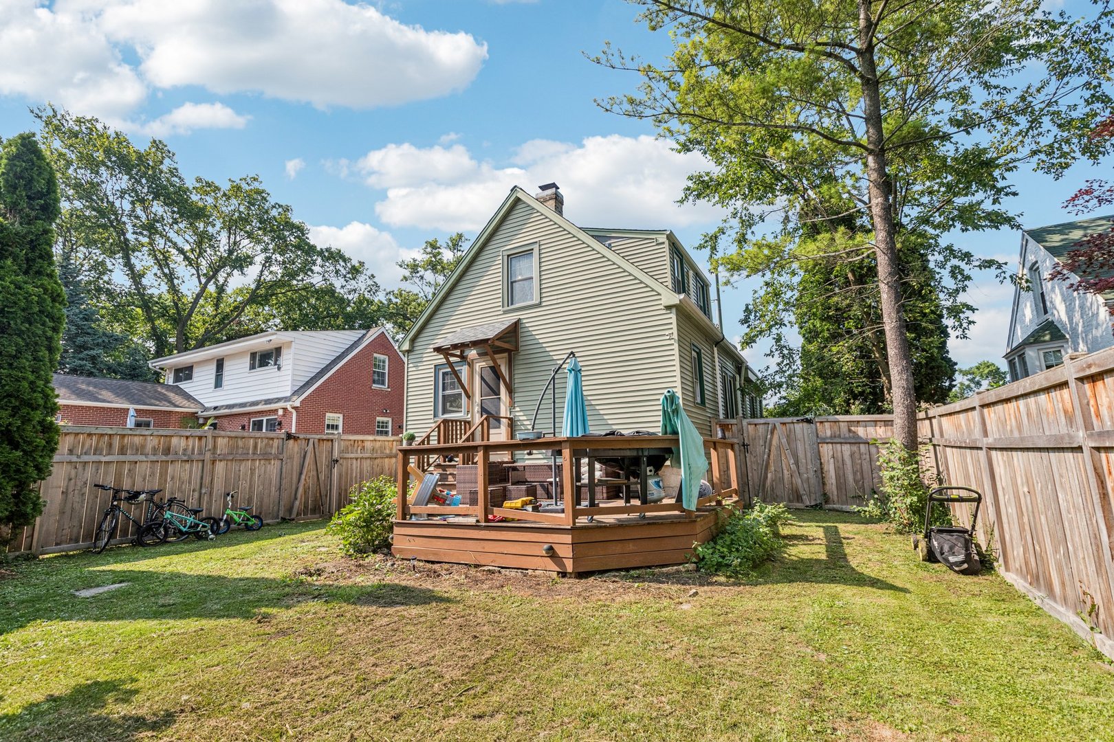 1656 Harding Road Northfield, IL 60093 - Photo 12 of 14 a view of a house with a yard and furniture