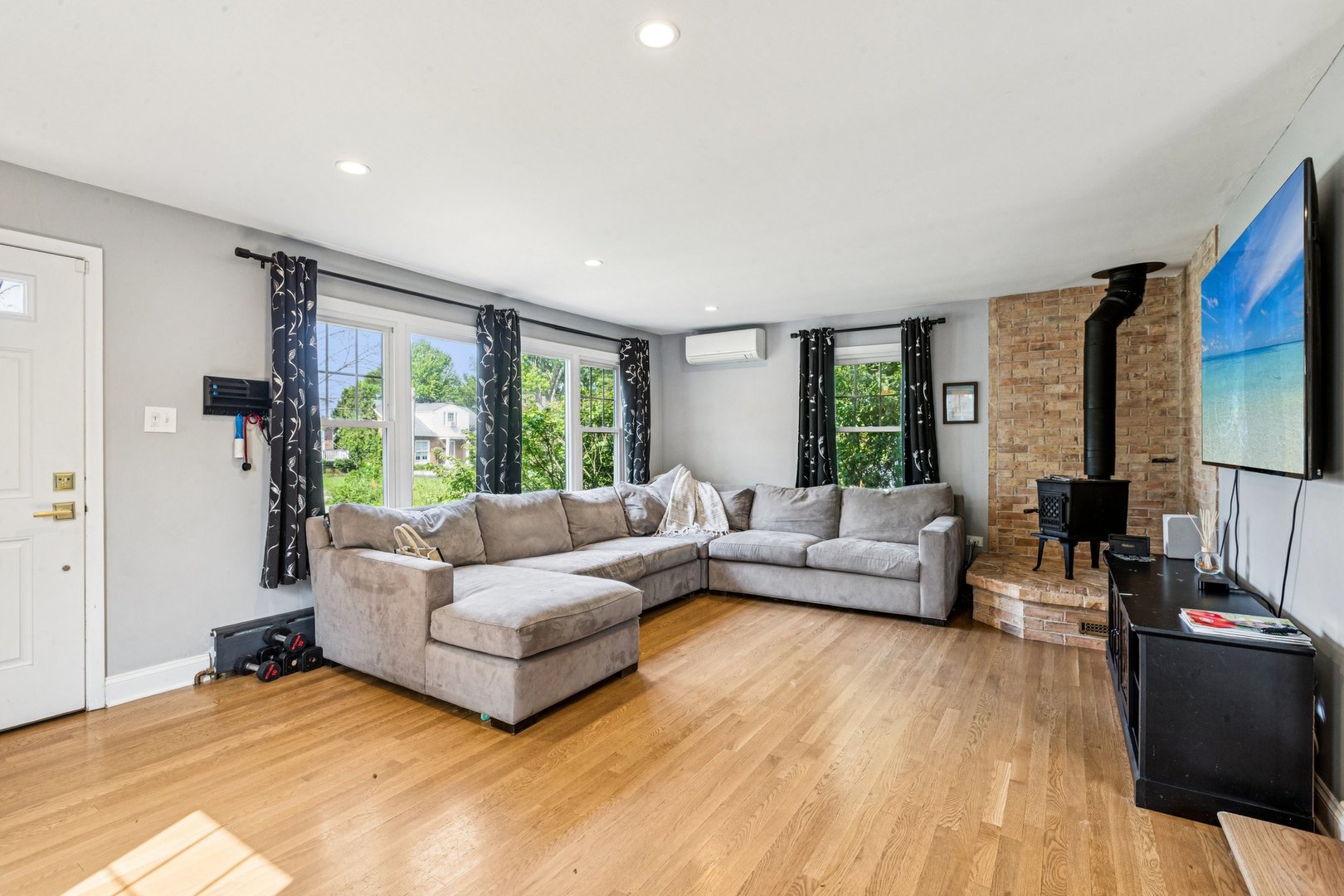 1656 Harding Road Northfield, IL 60093 - Photo 2 of 14 a living room with furniture and a large window