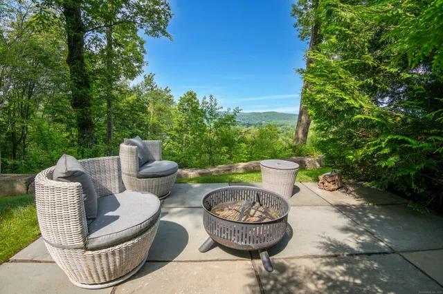 a view of a table and chair in the patio