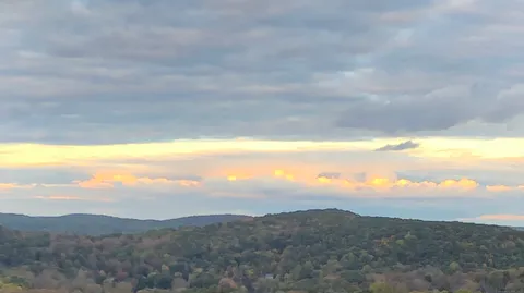 a view of city and mountain
