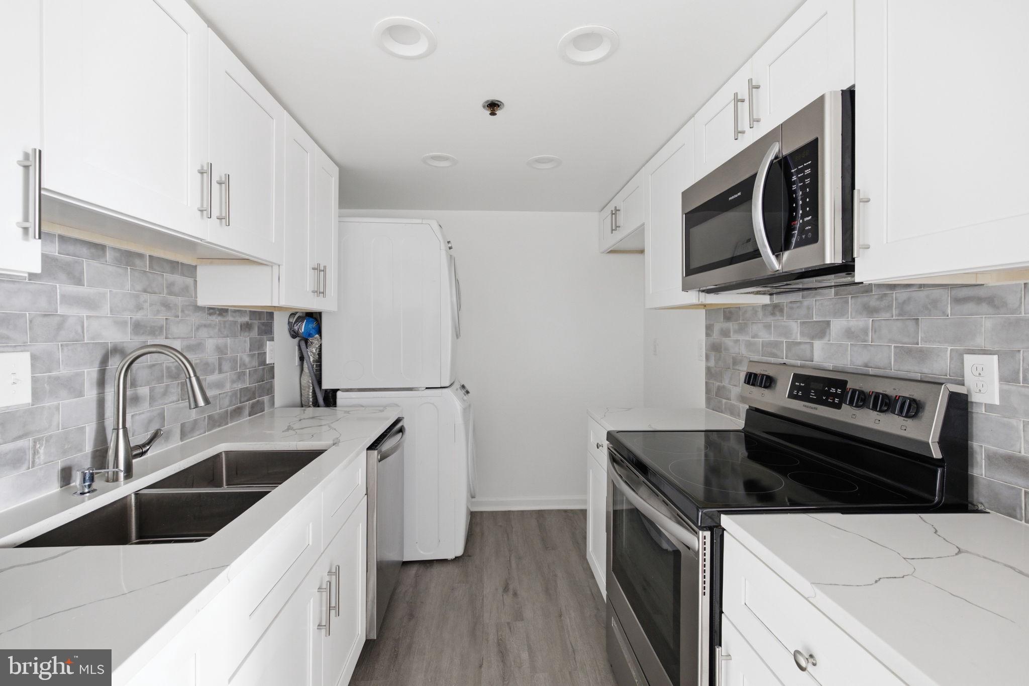 5911 Edsall Road, Unit 1201 Alexandria, VA 22304 - Photo 12 of 19 Modern kitchen with sleek finishes.