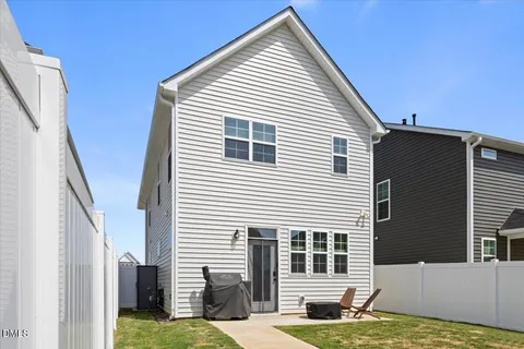 a view of house that has a window on the house