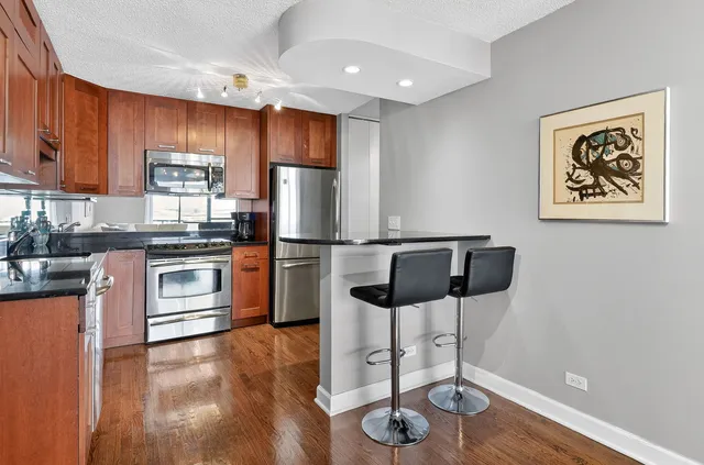 a view of livingroom with furniture and wooden floor