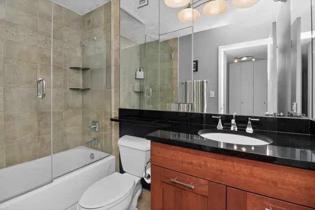 a view of a city with tall buildings