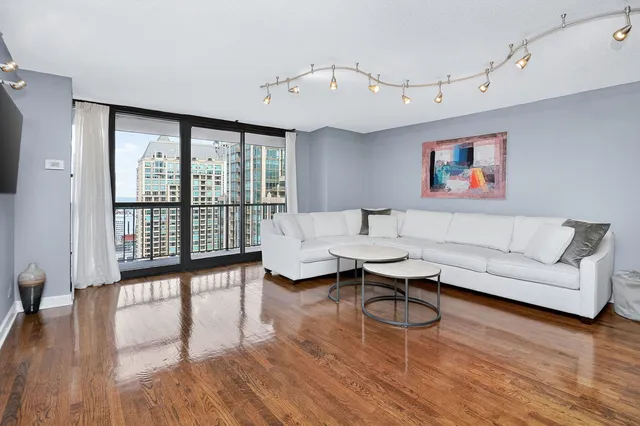 a living room with furniture and a window