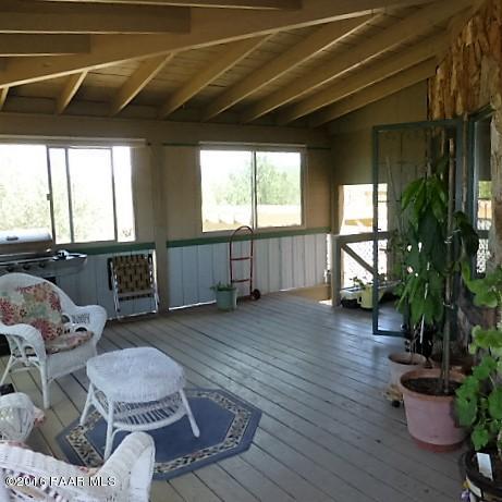 3229 Double A Ranch Road Williams, AZ 86046 - Photo 19 of 38 a living room with furniture and a wooden floor