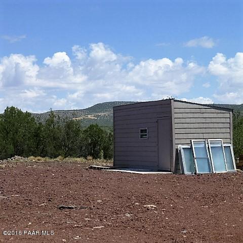 3229 Double A Ranch Road Williams, AZ 86046 - Photo 38 of 38 a view of outdoor space and front view of a house