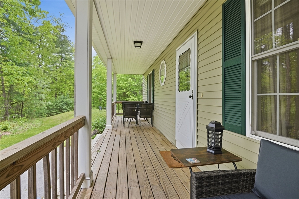 186 Common Street Groton, MA 01450 - Photo 5 of 28 a view of balcony with furniture