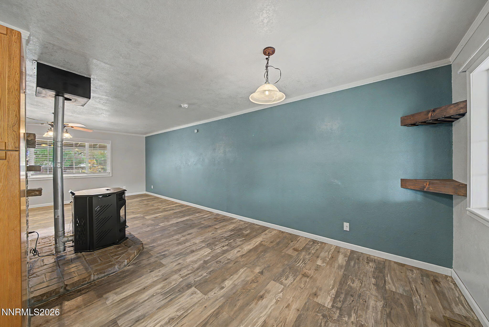 11577 Deodar Way Reno, NV 89506 - Photo 18 of 58 a view of an empty room with a window