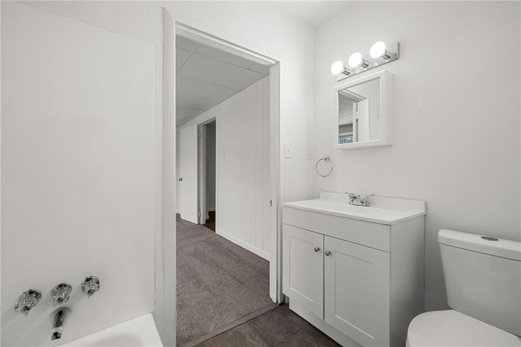 62 Maytide Street Pittsburgh, PA 15227 - Photo 11 of 23 a bathroom with a sink a toilet and shower