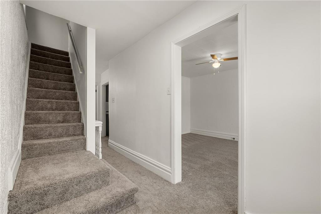 62 Maytide Street Pittsburgh, PA 15227 - Photo 18 of 23 a view of an empty room with stairs