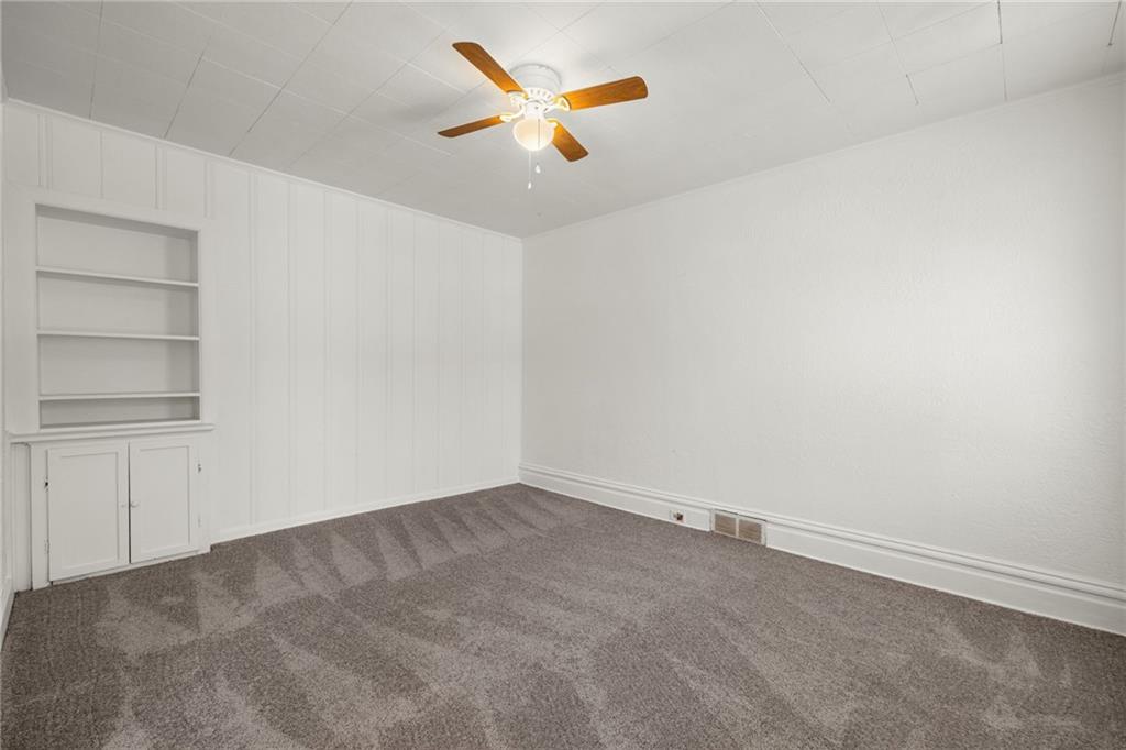 62 Maytide Street Pittsburgh, PA 15227 - Photo 19 of 23 an empty room with closet and windows