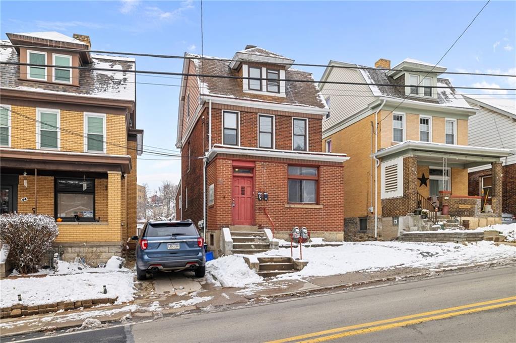 62 Maytide Street Pittsburgh, PA 15227 - Photo 2 of 23 a building with car parked in front of it
