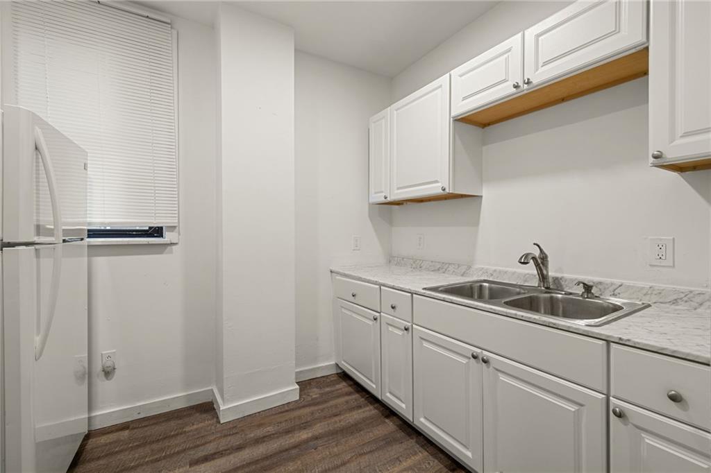 62 Maytide Street Pittsburgh, PA 15227 - Photo 6 of 23 a kitchen with a sink and cabinets