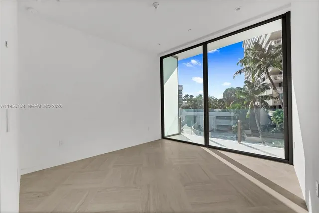 a view of a room with a large window