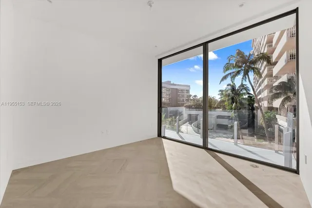 a view of a room with a large window