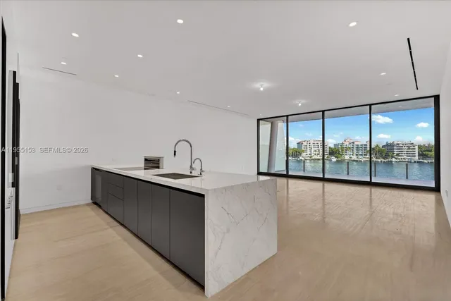 a view of an empty room with a large window