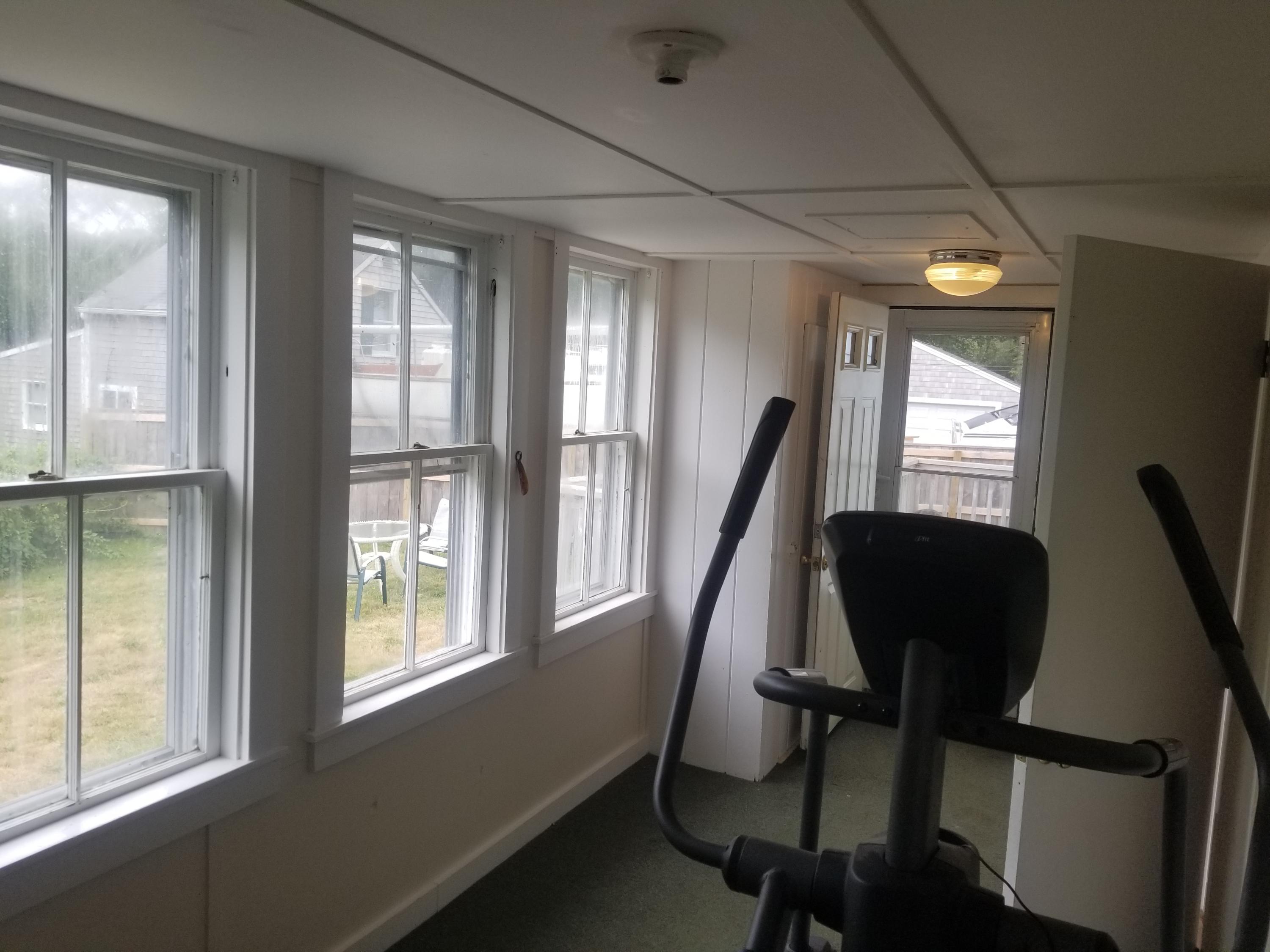 85 Shore Road Bourne, MA 02532 - Photo 13 of 16 a view of a room with furniture and window