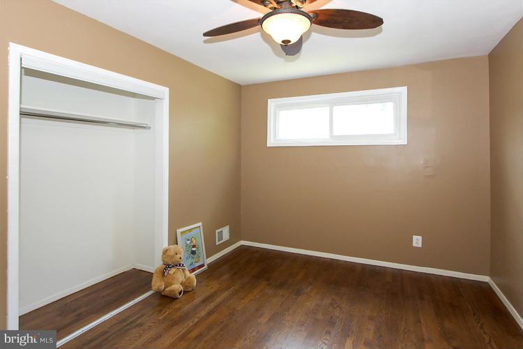 1005 Baltimore Road Rockville, MD 20851 - Photo 14 of 26 Master Bedroom w/Ceiling Fan (Custom Closet Doors)