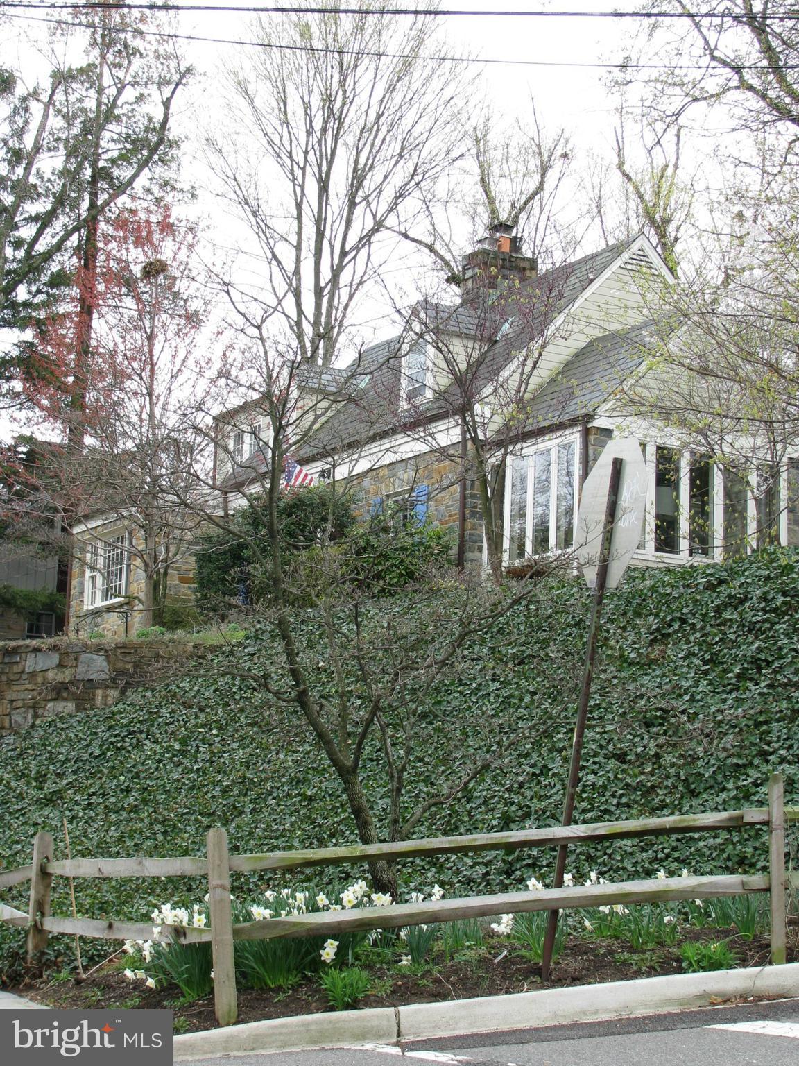 4664 Reservoir Road Northwest Washington, DC 20007 - Photo 2 of 60 a front view of a house with trees