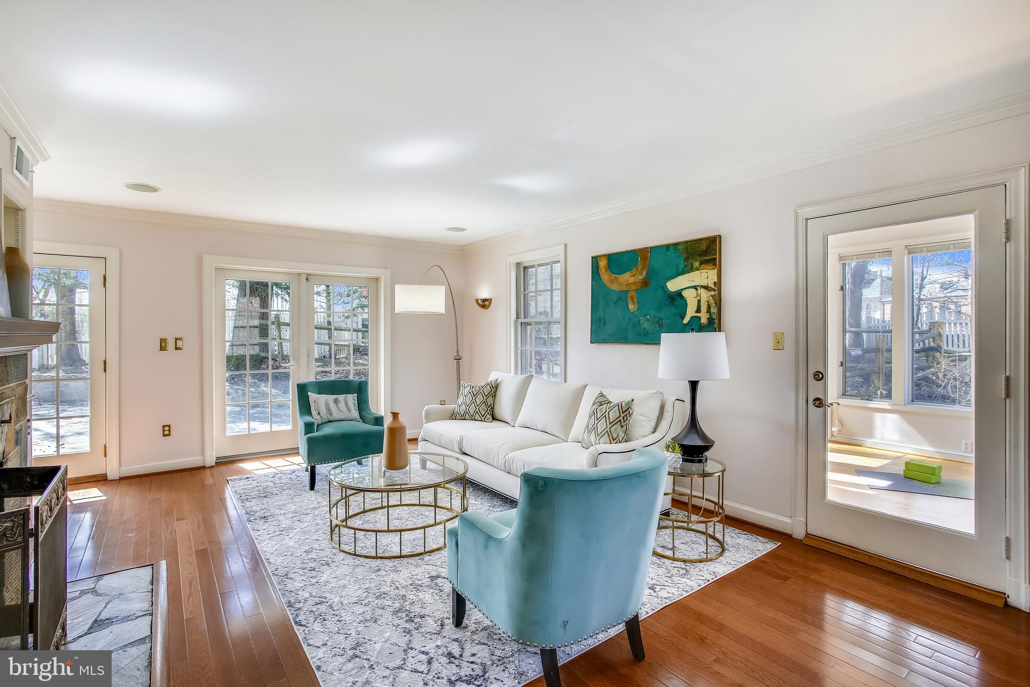 4664 Reservoir Road Northwest Washington, DC 20007 - Photo 16 of 60 a living room with fireplace furniture and a wooden floor