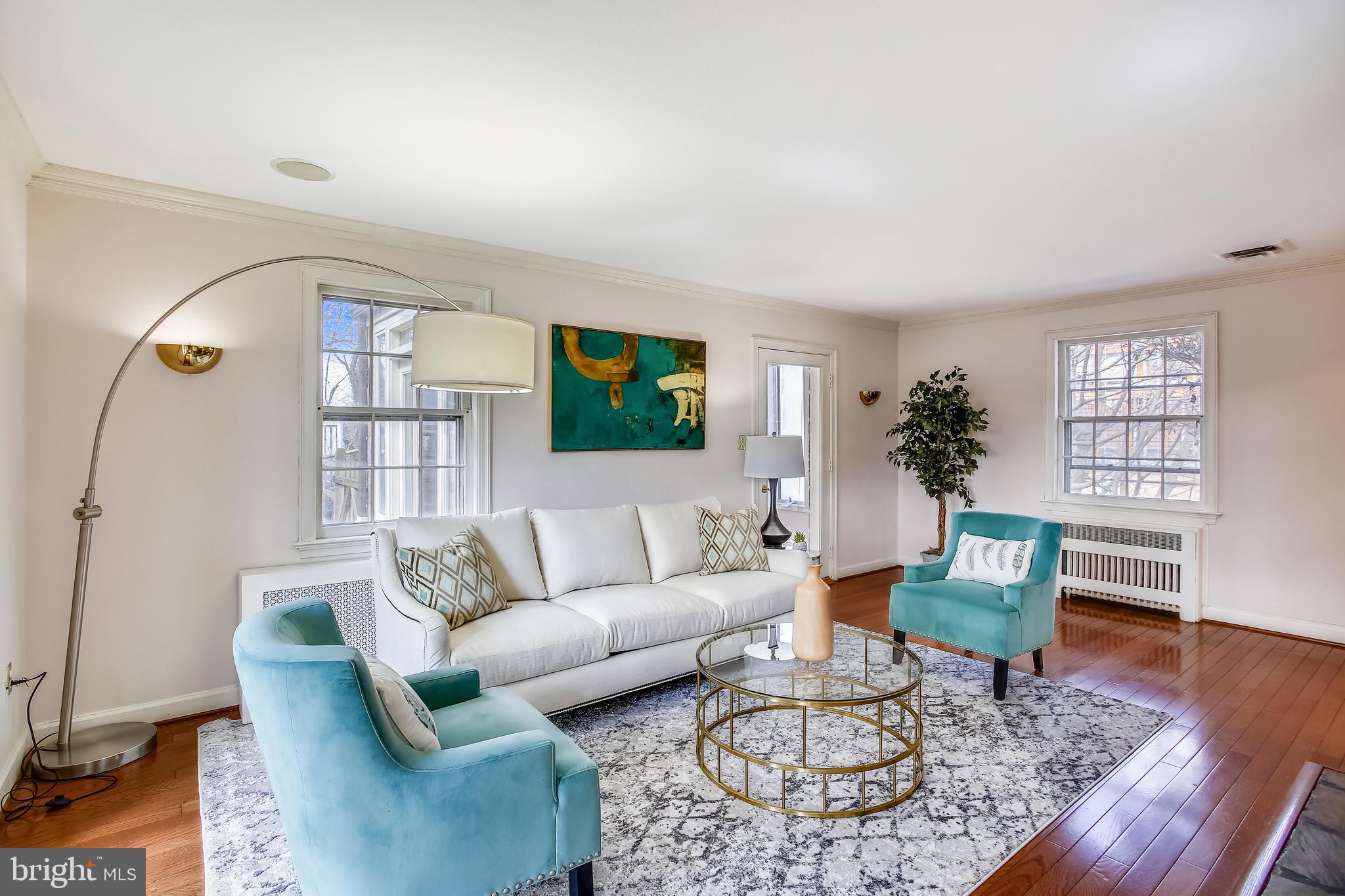 4664 Reservoir Road Northwest Washington, DC 20007 - Photo 17 of 60 a living room with furniture and a wooden floor