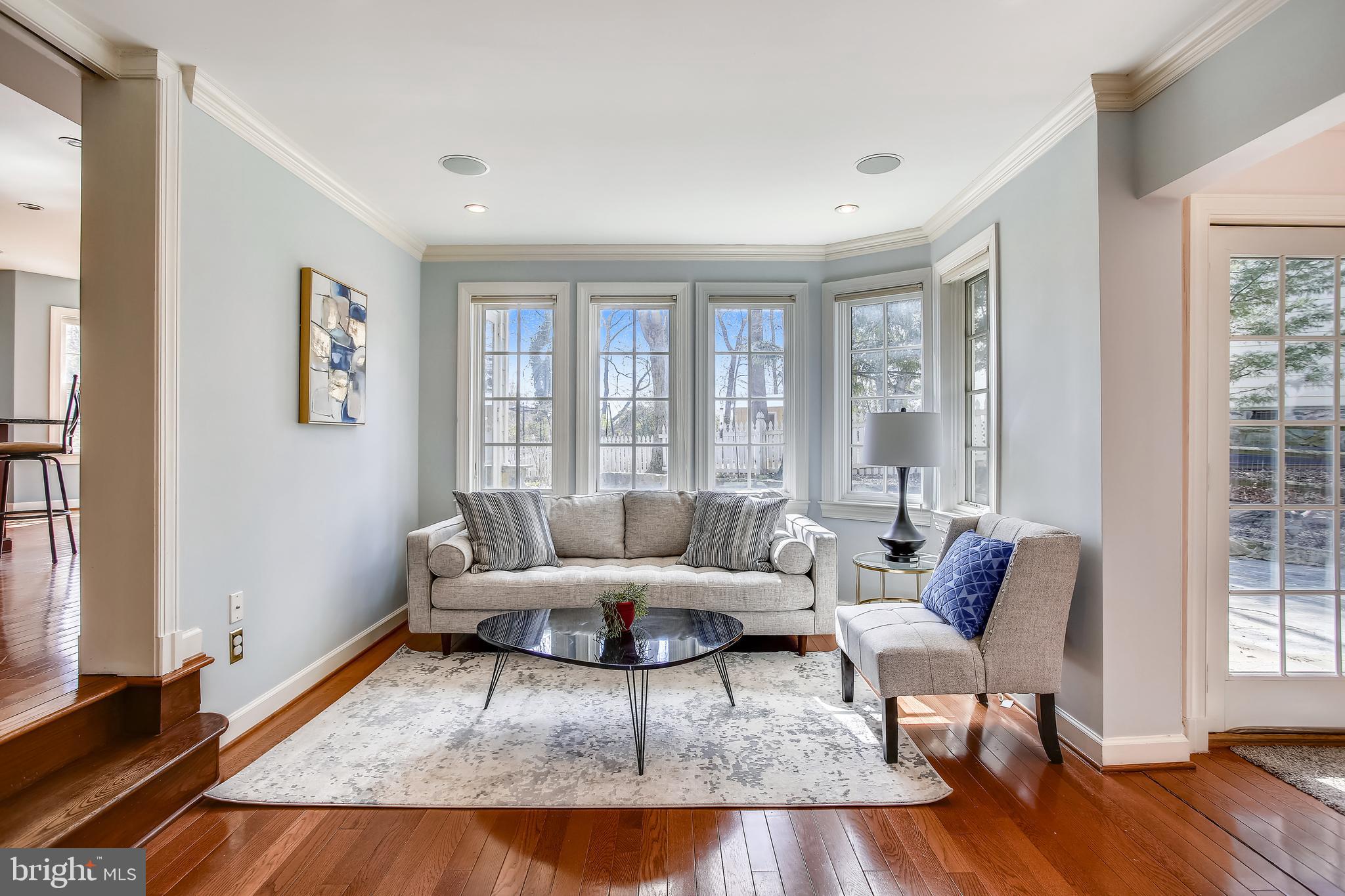 4664 Reservoir Road Northwest Washington, DC 20007 - Photo 26 of 60 a living room with furniture and a large window