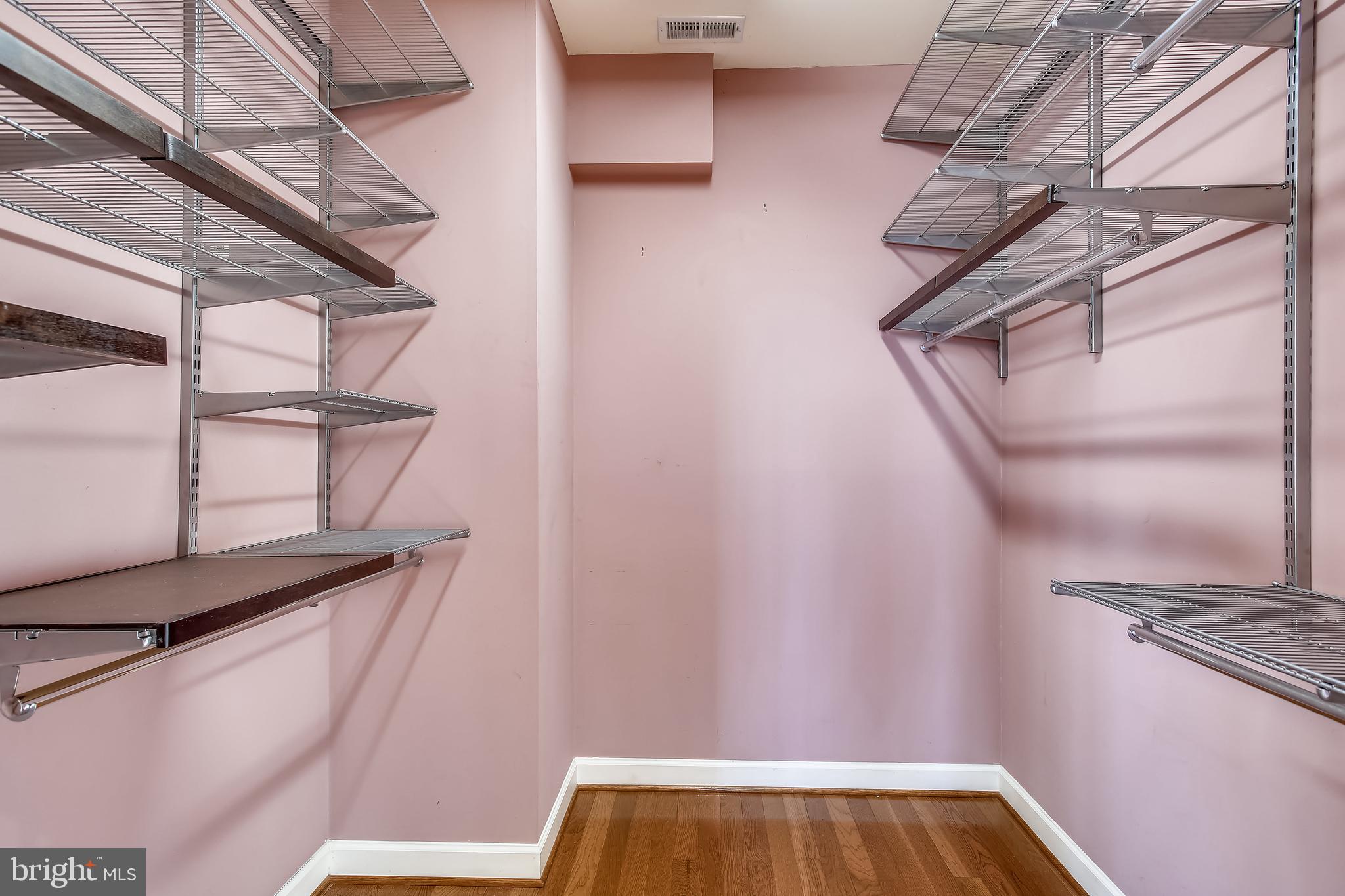 4664 Reservoir Road Northwest Washington, DC 20007 - Photo 32 of 60 a view of walk in closet with empty racks