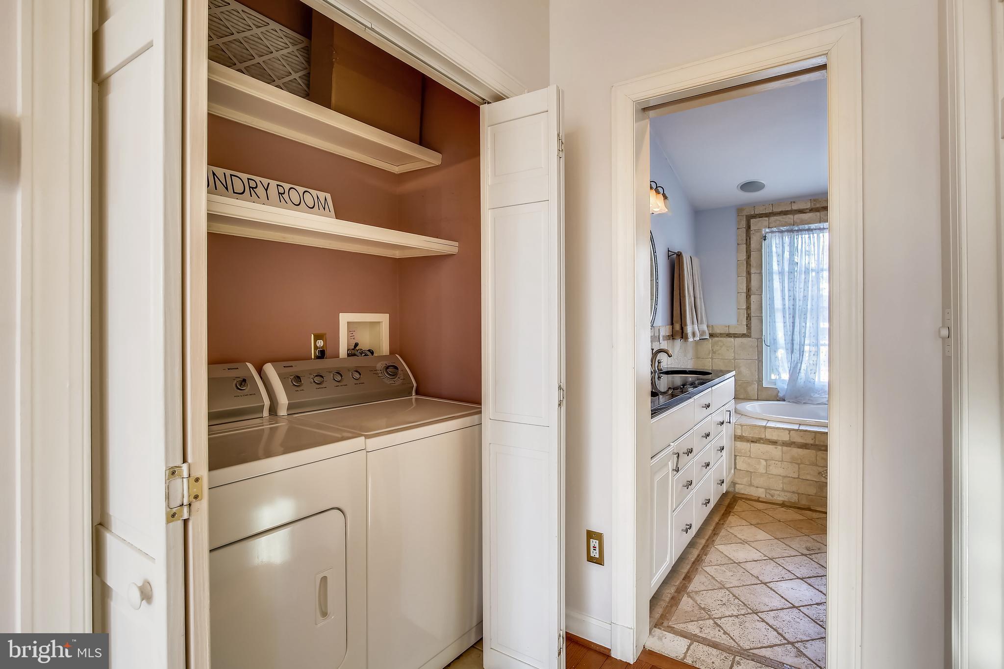 4664 Reservoir Road Northwest Washington, DC 20007 - Photo 36 of 60 a room with a washer and dryer