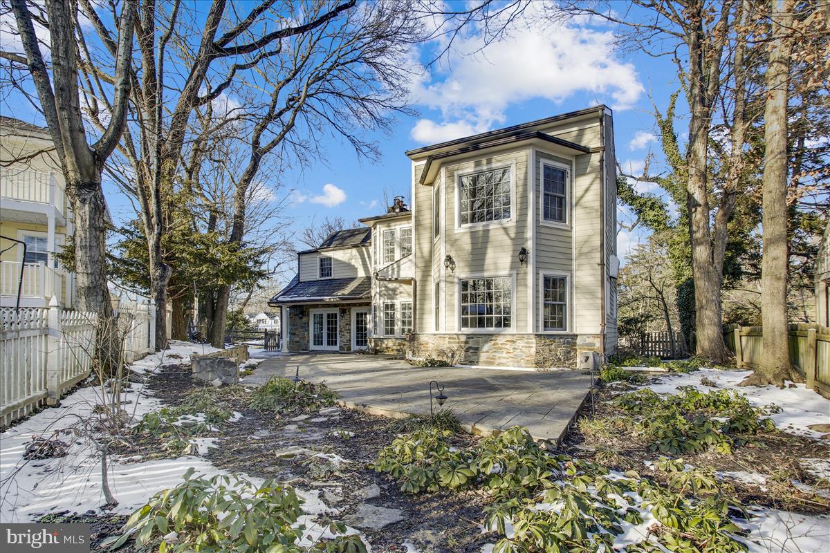 4664 Reservoir Road Northwest Washington, DC 20007 - Photo 51 of 60 a view of a building with a yard