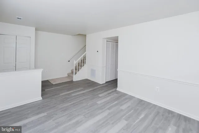 a view of entryway with wooden floor