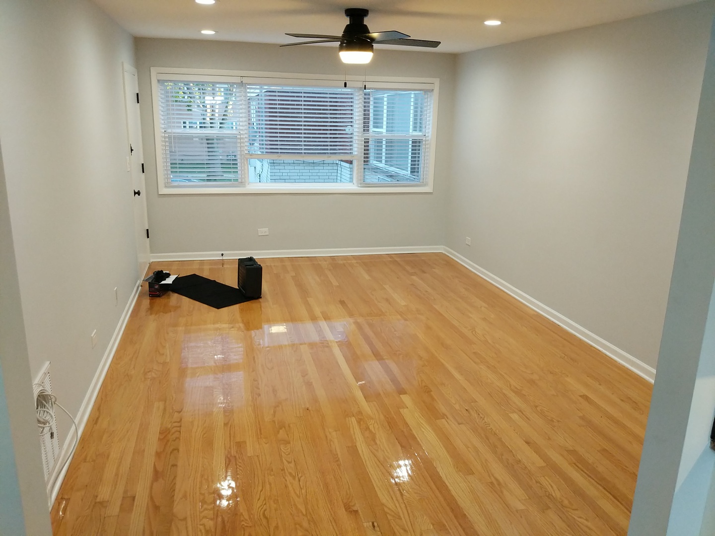 2652 West Rascher Avenue, Unit 203 Chicago, IL 60625 - Photo 12 of 17 a bedroom with a bed and a window