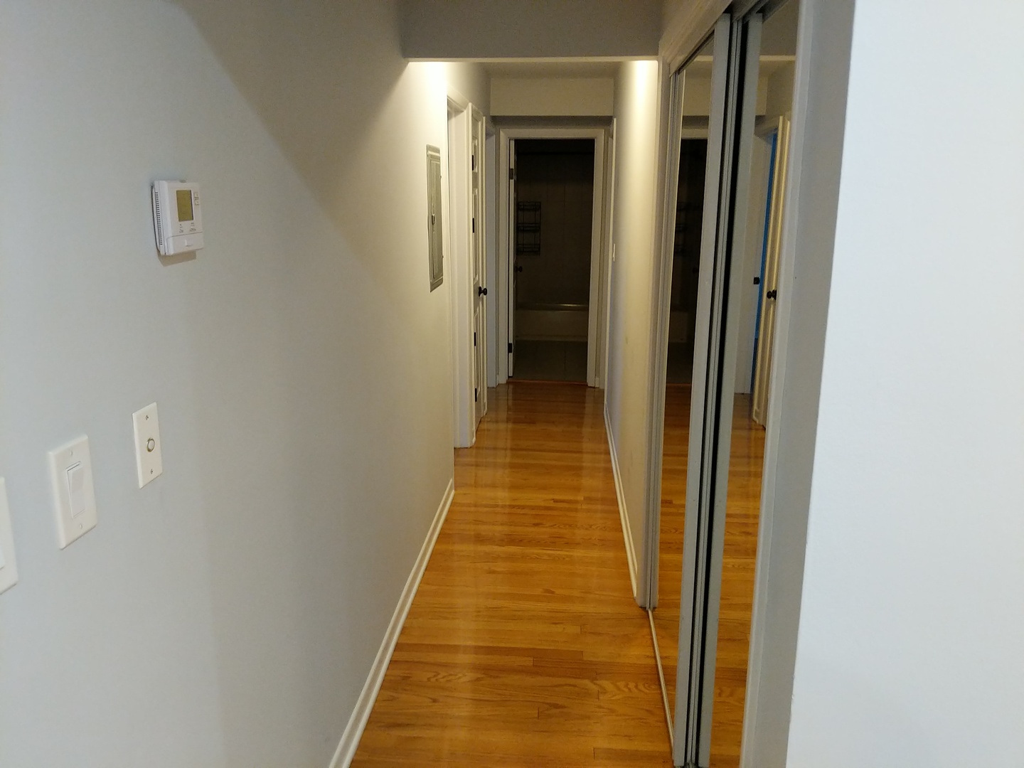 2652 West Rascher Avenue, Unit 203 Chicago, IL 60625 - Photo 13 of 17 a view of a hallway with wooden floor