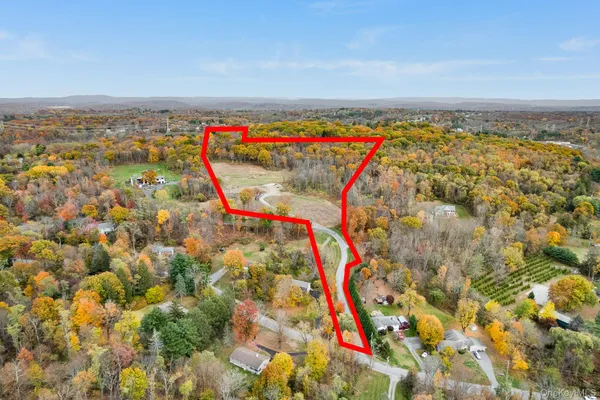 a view of a yard with an ocean