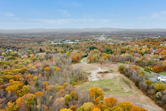 a view of a yard with an ocean view