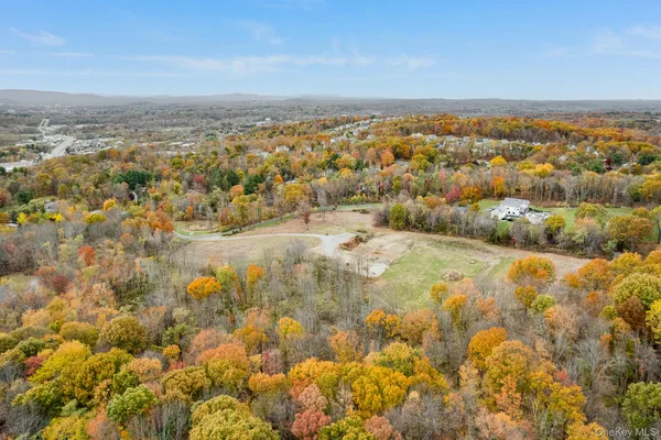 a view of a yard with an ocean view