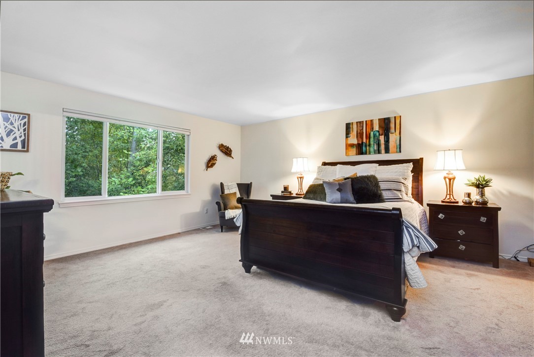 2405 194th Street Southeast Bothell, WA 98012 - Photo 19 of 28 a living room with furniture and a window