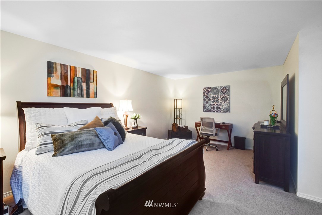 2405 194th Street Southeast Bothell, WA 98012 - Photo 20 of 28 a bedroom with a bed and furniture