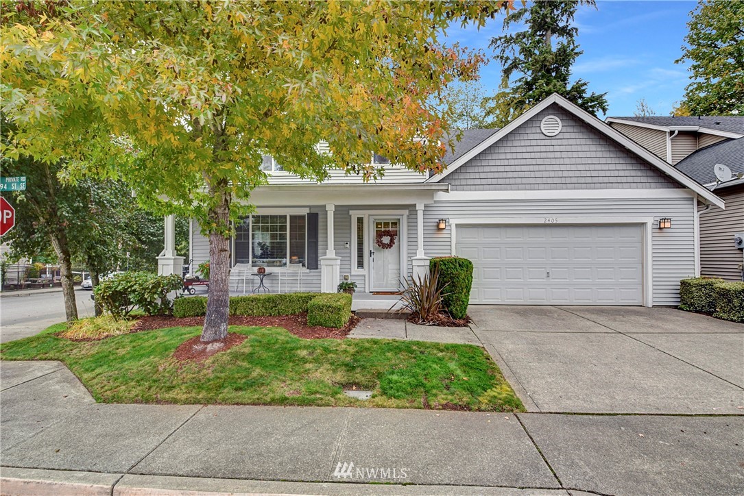 2405 194th Street Southeast Bothell, WA 98012 - Photo 3 of 28 a view of house with a yard and patio