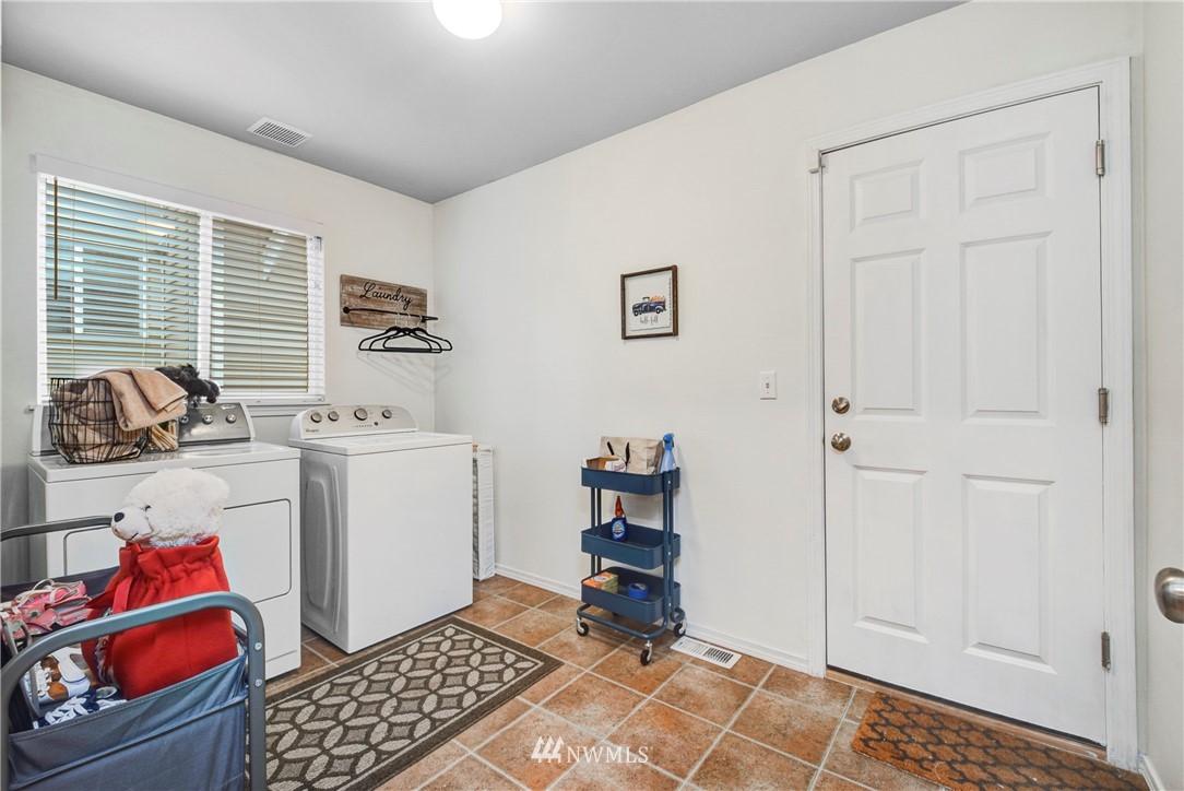 2405 194th Street Southeast Bothell, WA 98012 - Photo 27 of 28 a room with storage and utility