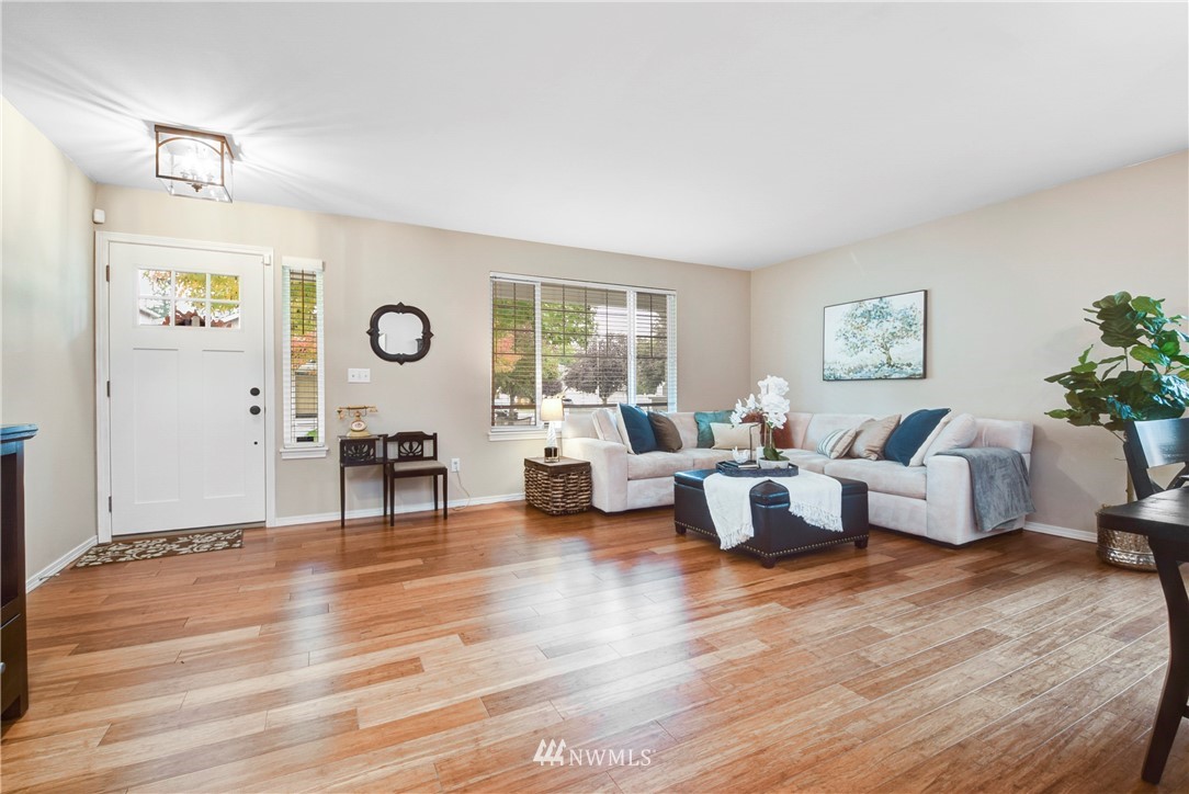 2405 194th Street Southeast Bothell, WA 98012 - Photo 6 of 28 a living room with furniture and wooden floor