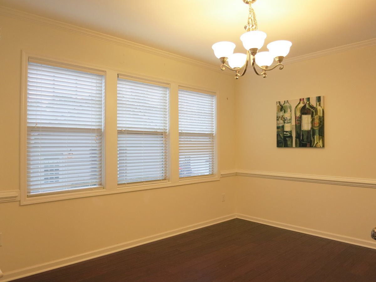 1556 Rodessa Run Raleigh, NC 27607 - Photo 5 of 25 The sunny Dining Area has a door to the covered rear Porch - ideal for grilling & entertaining! Dining Area
