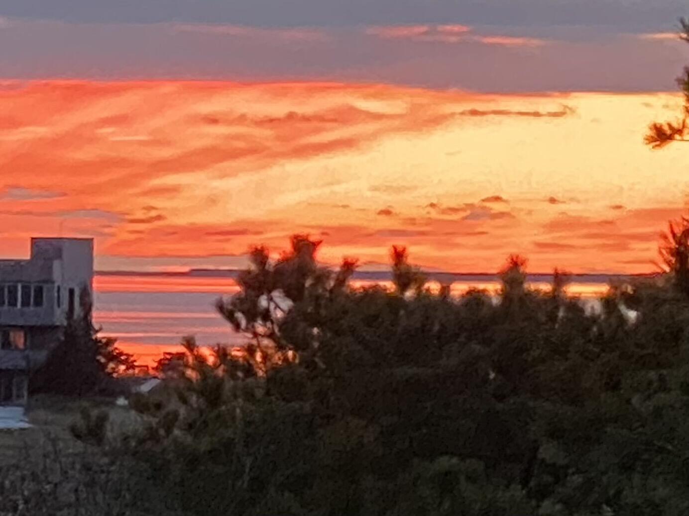 55 Lookout Road Wellfleet, MA 02667 - Photo 2 of 13 a view of a city with sunset view